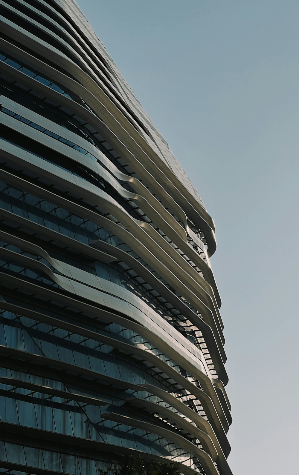 a very tall building with a clock on it's side