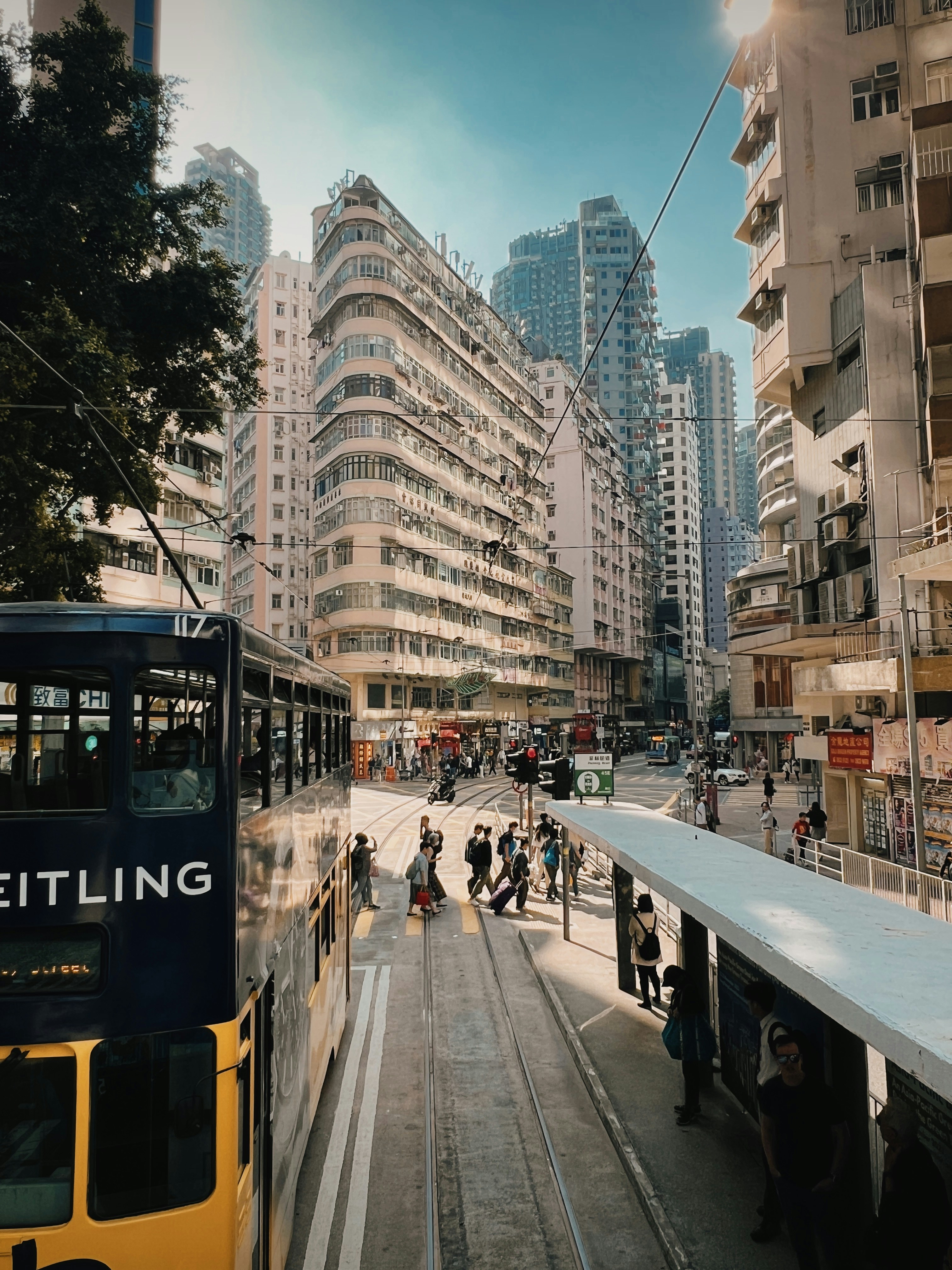 a city street filled with lots of tall buildings