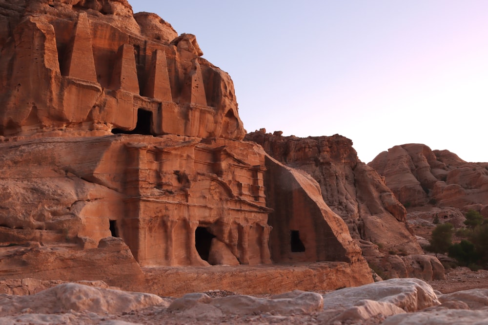 a rock formation with a cave in the middle of it