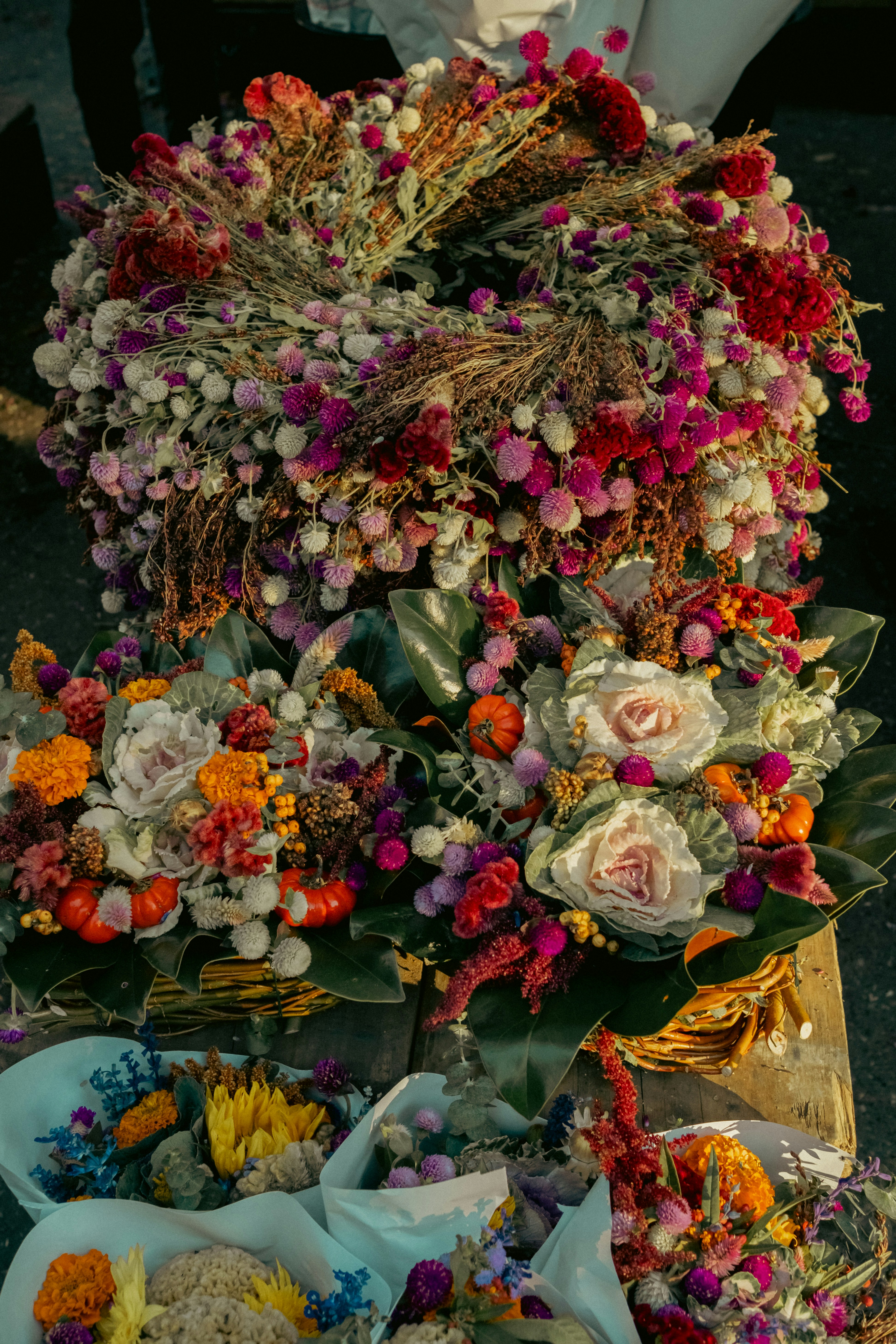 a bunch of flowers that are on a table