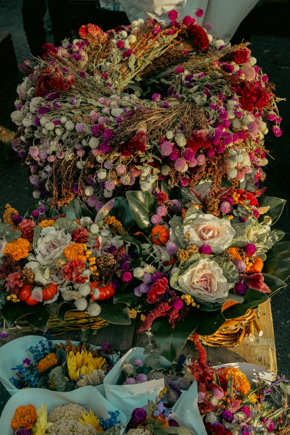 a bunch of flowers that are on a table