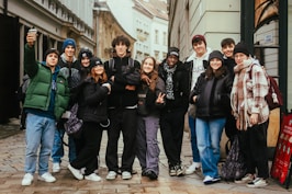 a group of young people standing next to each other