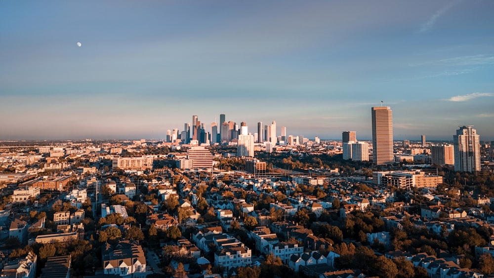 an aerial view of a city with tall buildings