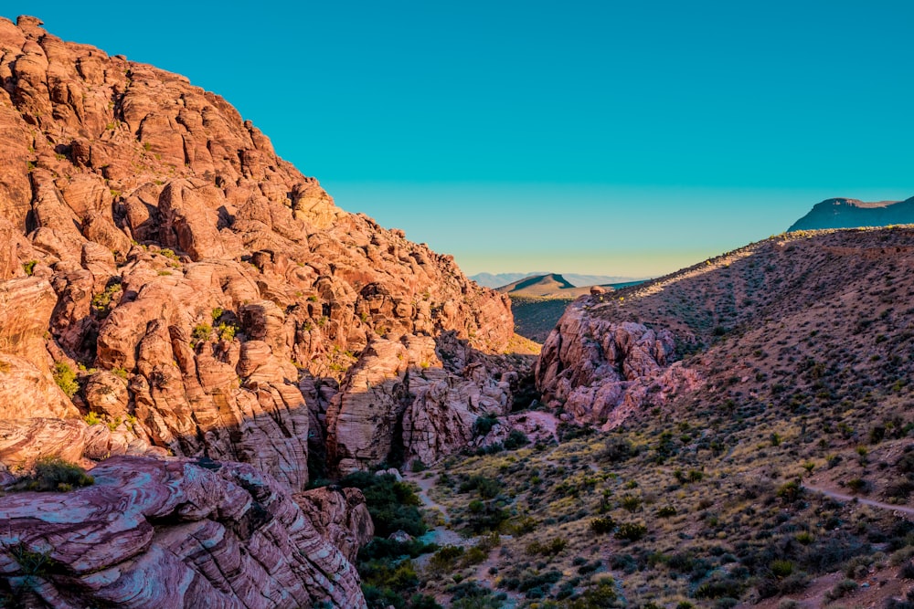 a view of a mountain with a road going through it