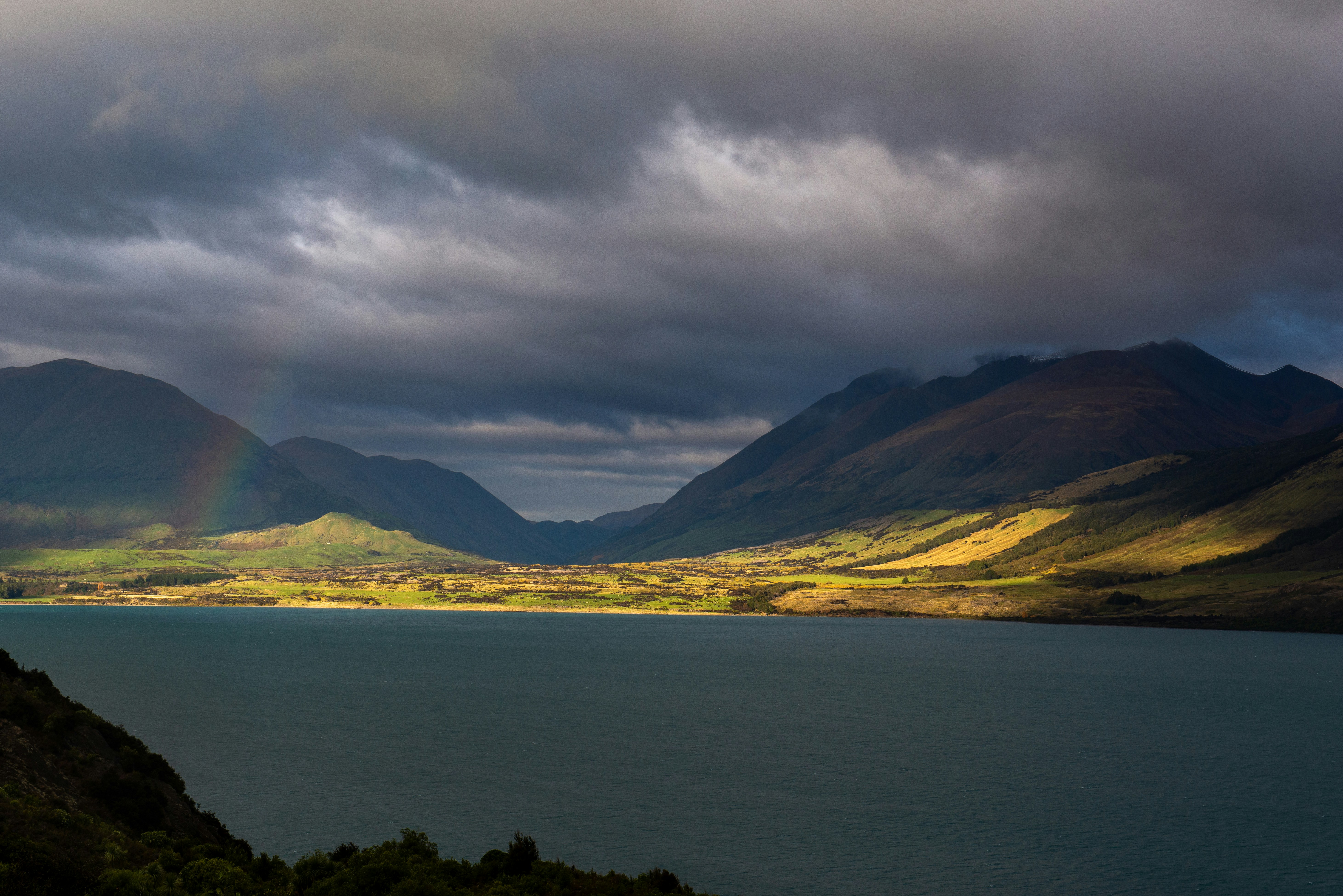 a large body of water surrounded by mountains