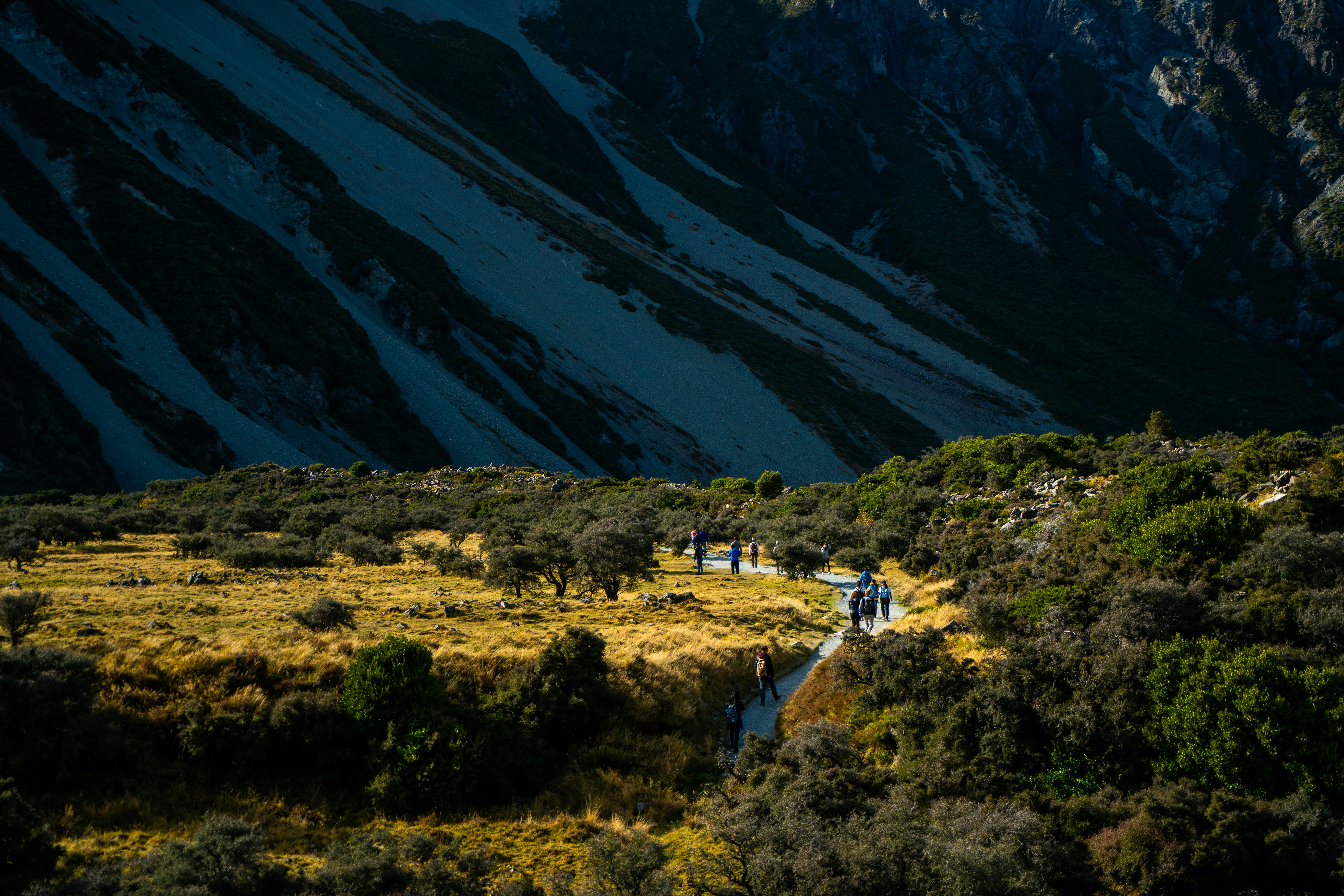 Hiker in New Zealand's dramatic landscape - solo travel destinations