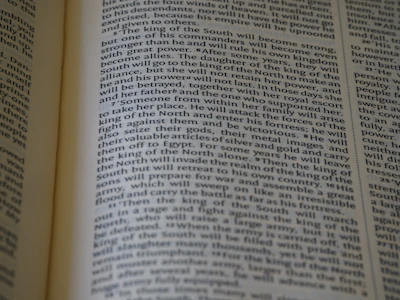 An open ebook on productivity with clean, easy-to-read typography on a calming background.