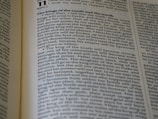 A page from a book is open, displaying text in a serif font. The focus is on a section titled 'The kings of the south and the north'. The text discusses a prophecy regarding powerful kings and their empires. The page shows multiple columns and paragraphs filled with dense text.