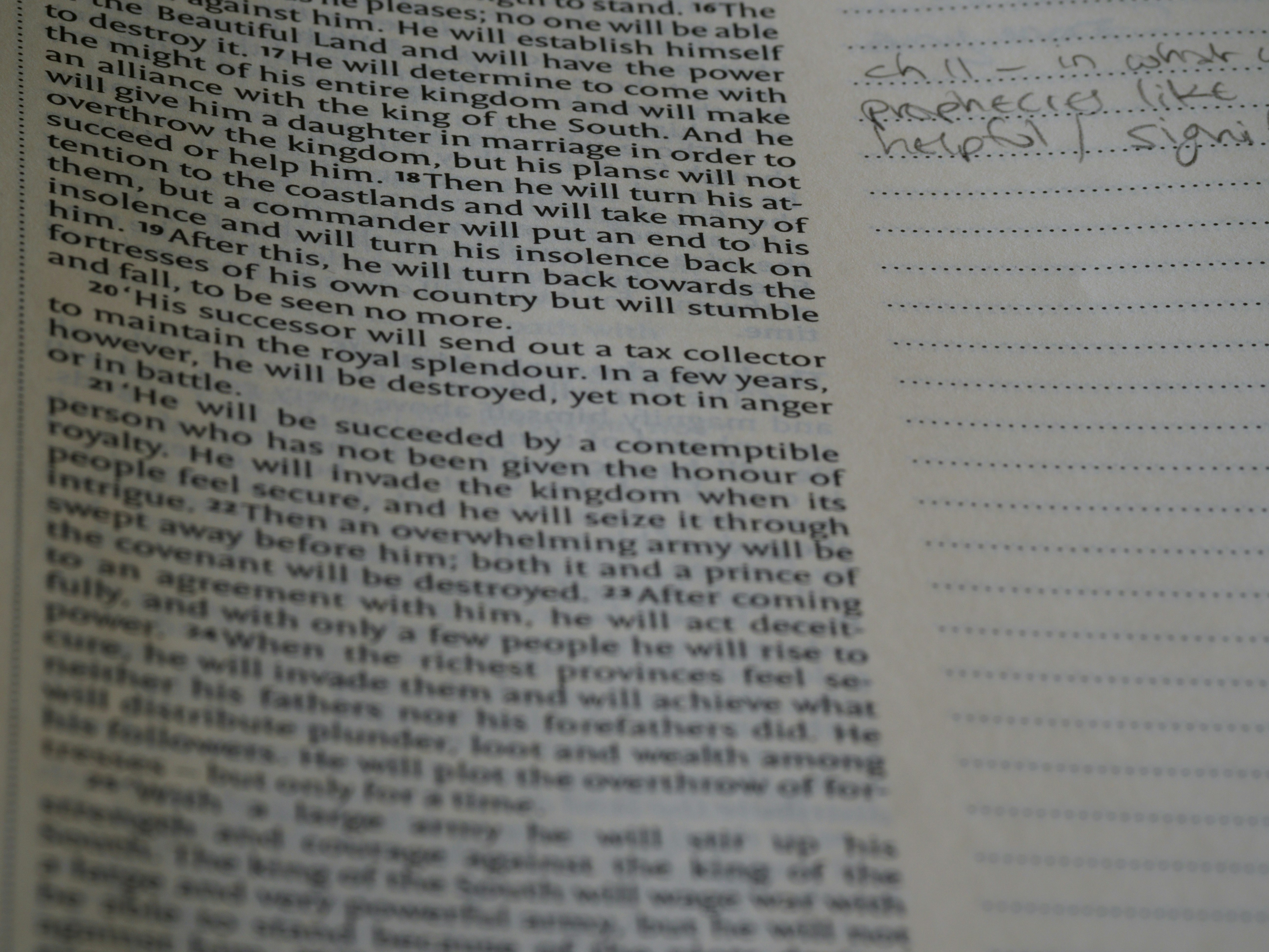 a close up of a book with writing on it