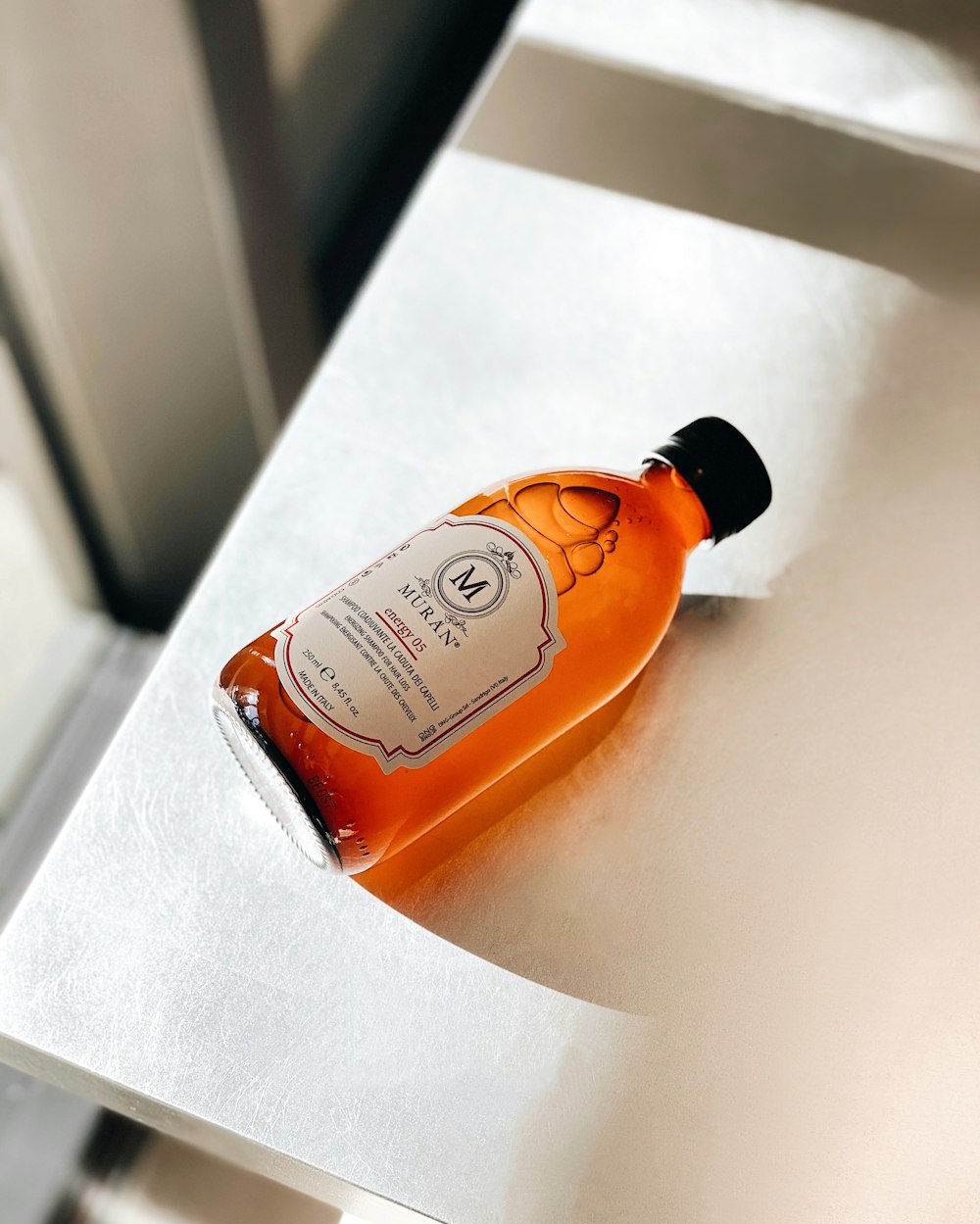 a bottle of alcohol sitting on top of a counter