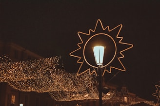 Star of Bethlehem light decoration shining warmly on a festive street