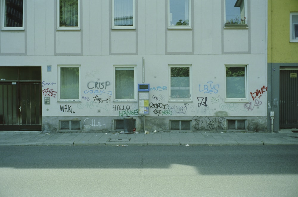 a building with graffiti on the side of it