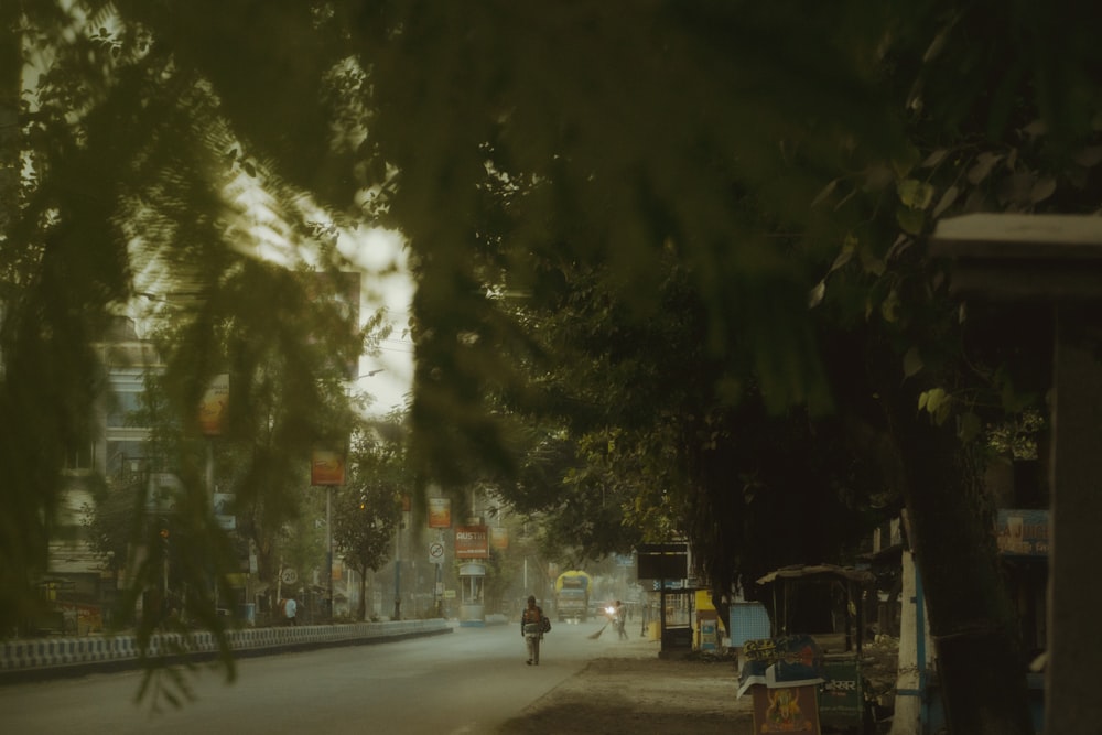 a person riding a bike down a street