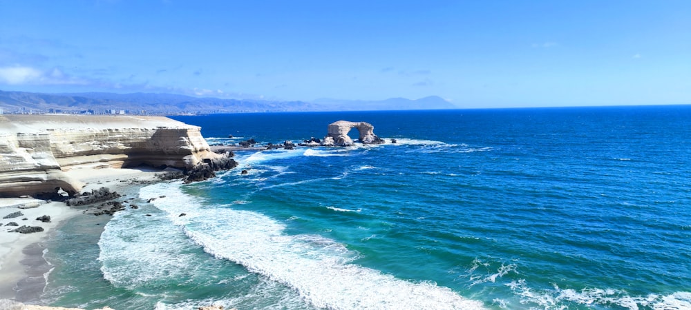 a view of the ocean from a cliff