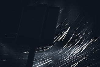 Poster preview of an upcoming film with a mysterious rain streak effect and dark tones