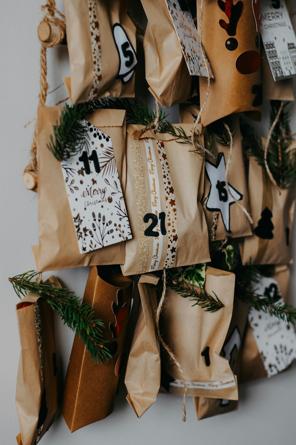 a bunch of brown bags with numbers on them