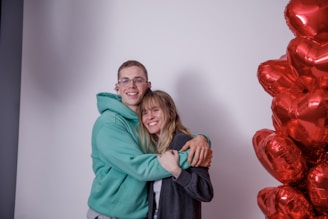 A couple celebrating after selling their home.