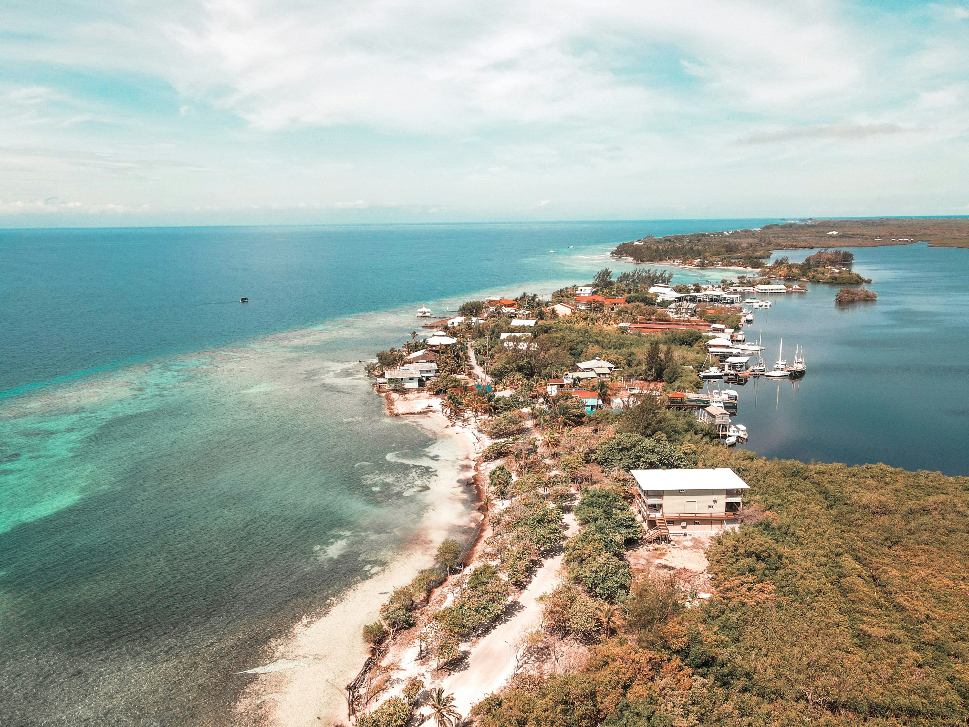 an aerial view of a small island in the middle of the ocean, Panoramic view of Utila