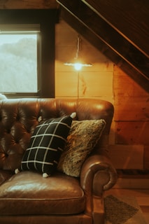 Cozy living room corner with soft cushions and warm lighting