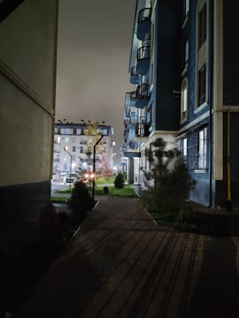 Safe, well-lit pathways around the housing complex at dusk.