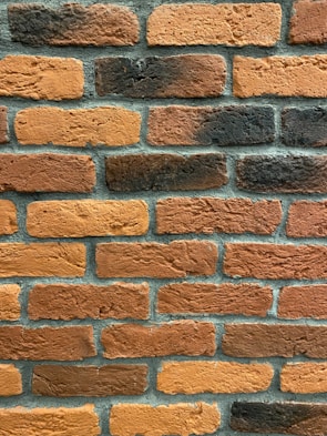 a close up of a brick wall made of bricks
