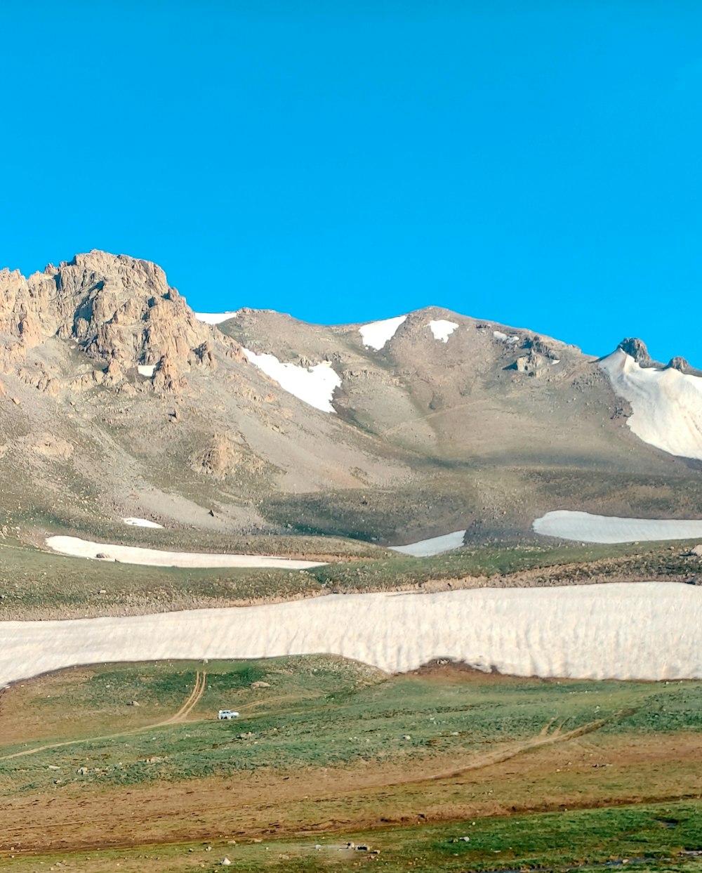 a mountain range with a river running through it