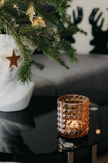 A festive home setting decorated with vantalo’s calligraphy frames, blending emerald green and gold hues for a spiritual ambiance.