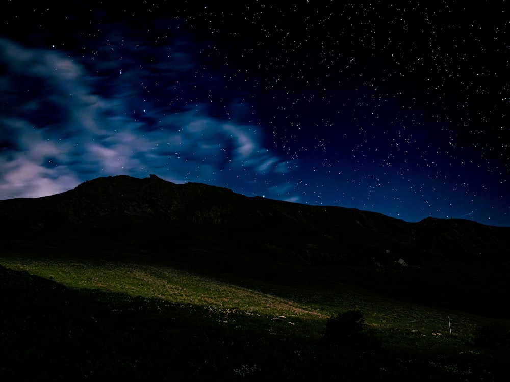 the night sky is full of stars and clouds