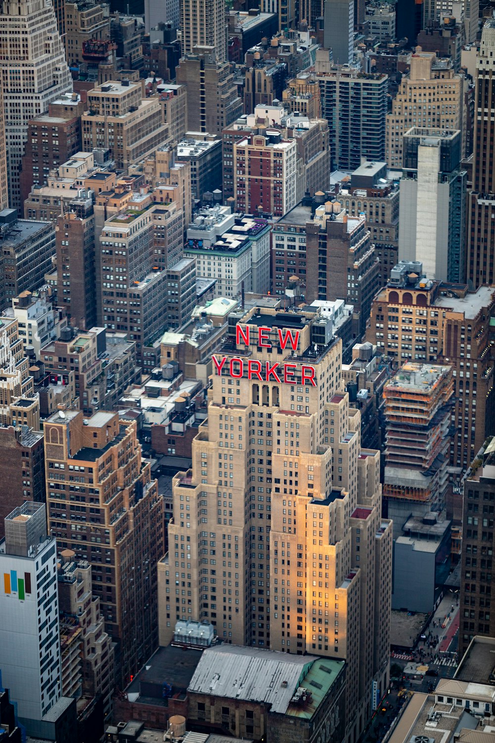 an aerial view of a city with tall buildings