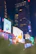 A vibrant social media campaign displayed on multiple digital devices in a bright environment.
