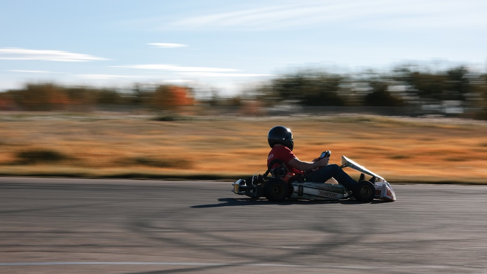 a person riding a motorcycle on a road