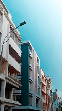 a tall building with balconies and balconies on the side of it