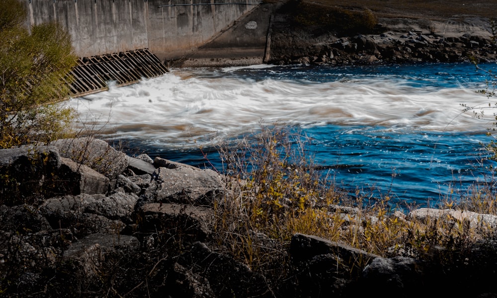 a large body of water surrounded by rocks