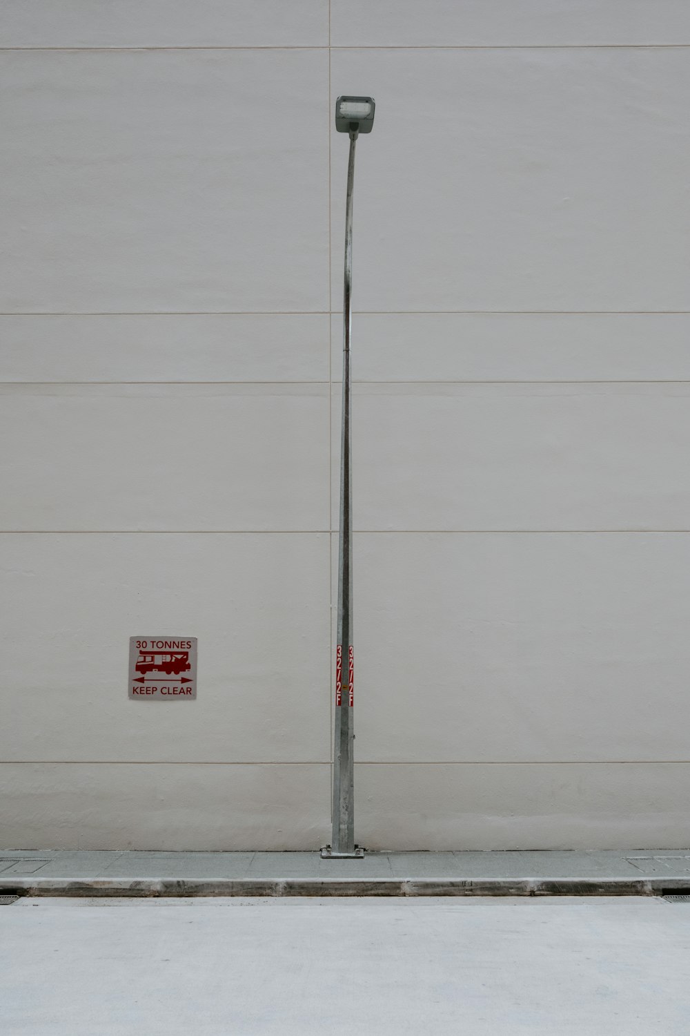 a pole with a street light attached to it
