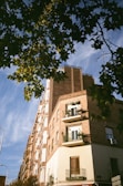 a tall building with balconies and balconies on the balconies