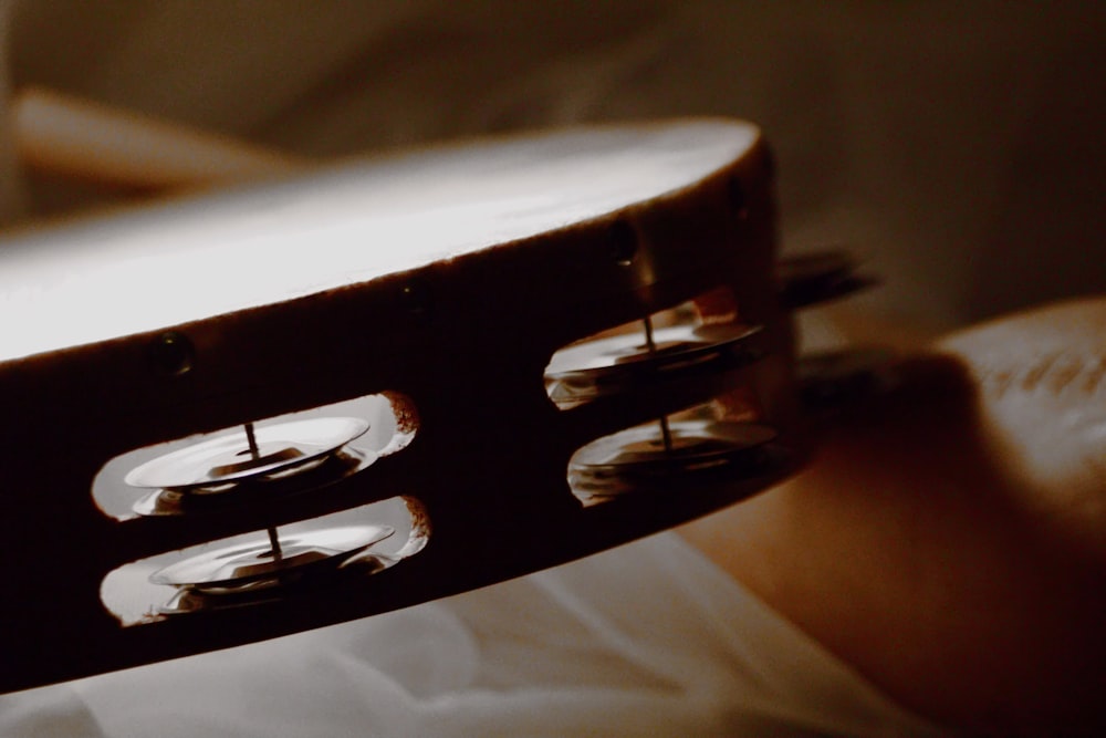 a close up of a person holding a guitar