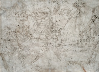 Behind-the-scenes glimpse of the team sketching naval architecture designs beside gaming concept art.