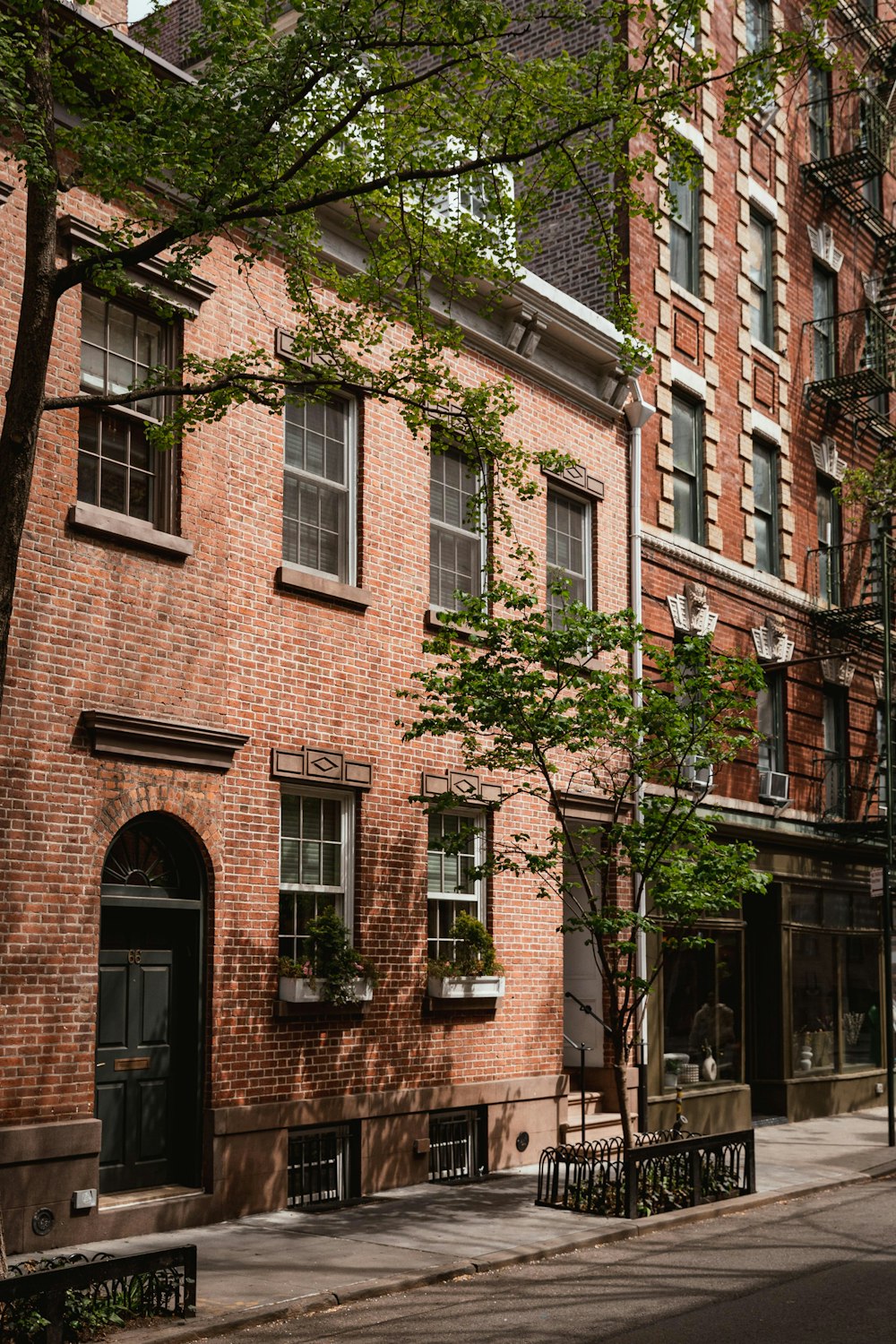 a red brick building on a city street