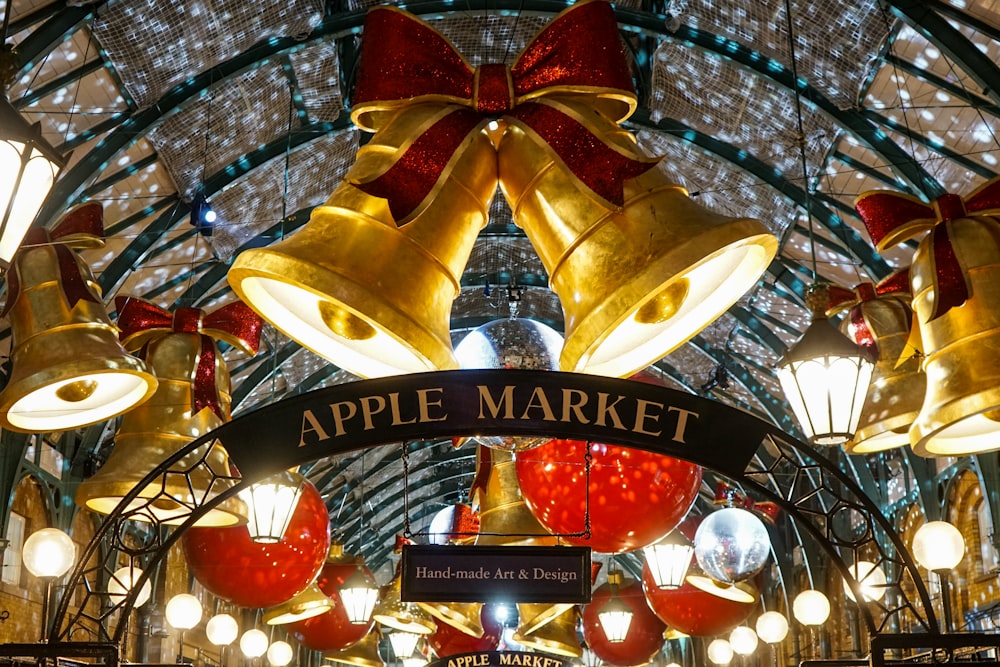 a building with a bunch of bells hanging from it's ceiling