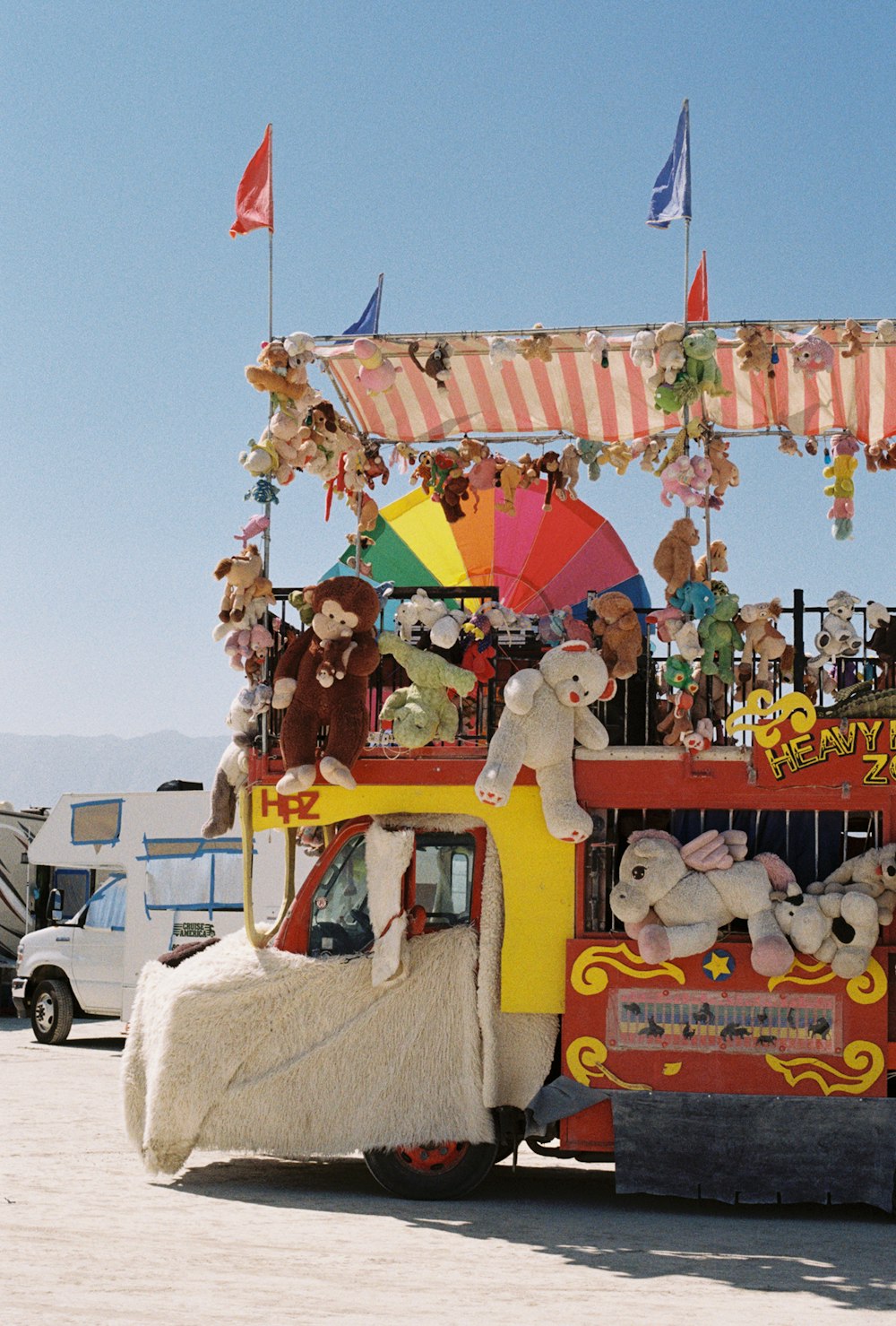 a bus with stuffed animals on top of it