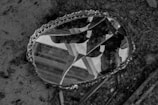 a broken mirror sitting on the ground