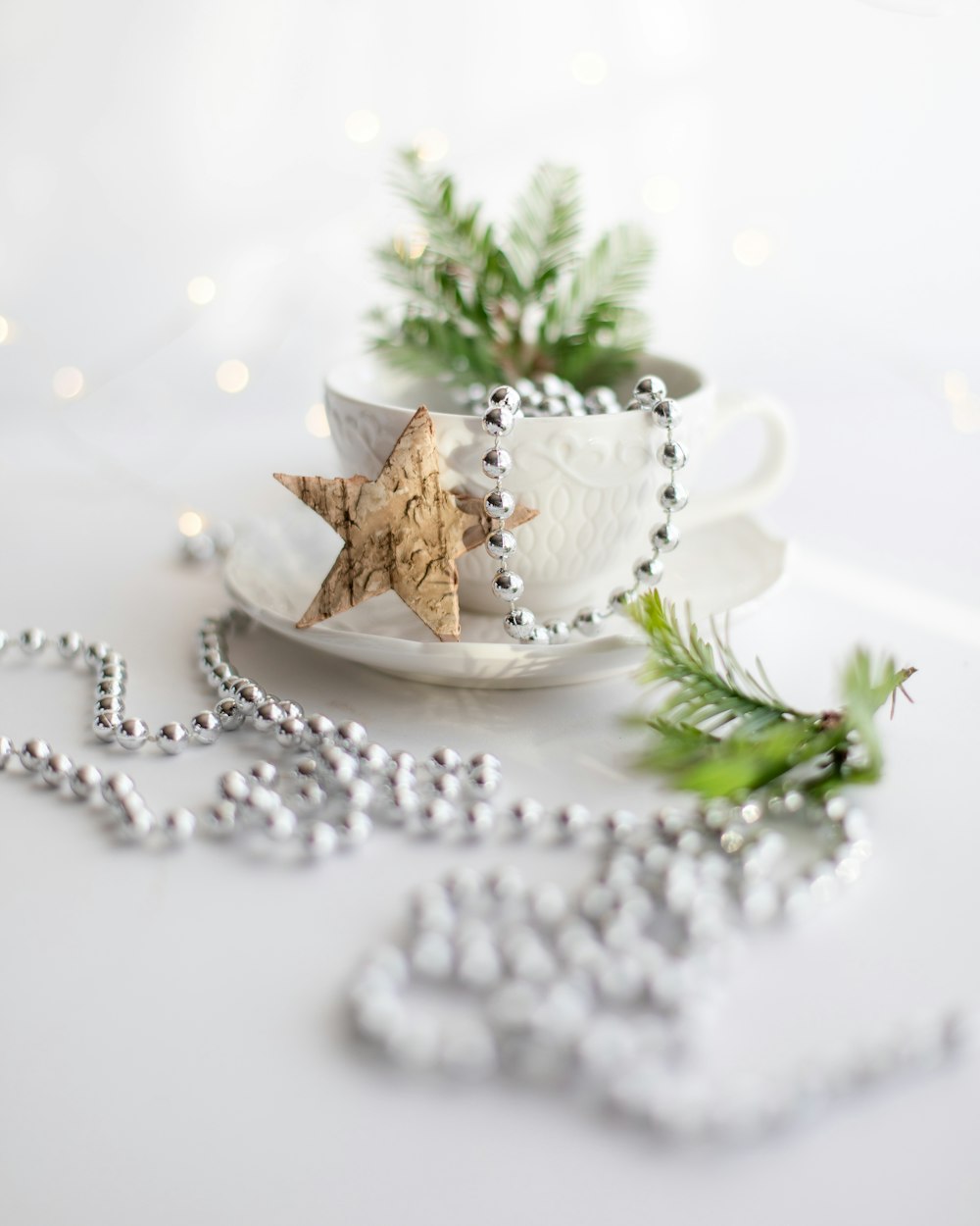 a tea cup with a star decoration on it