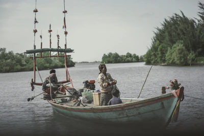 Family enjoying a peaceful fishing trip on the calm waters from the yacht.