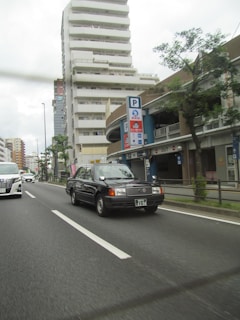 A fleet of vehicles equipped with GPS tracking devices on a city street.