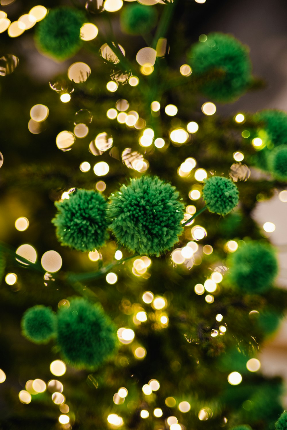 a close up of a green christmas tree