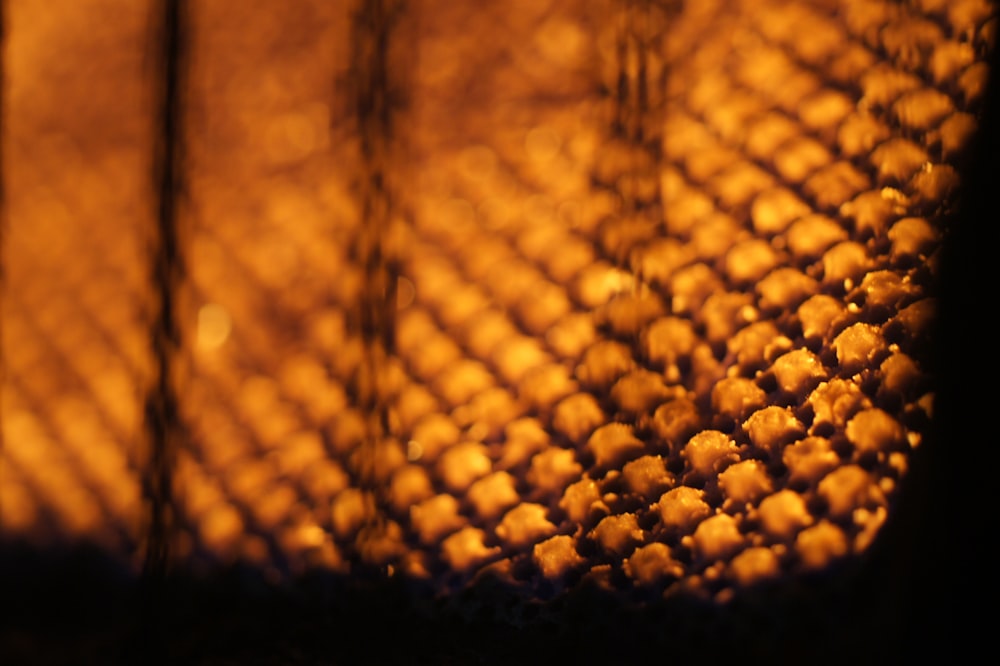 a close up view of a mesh fence