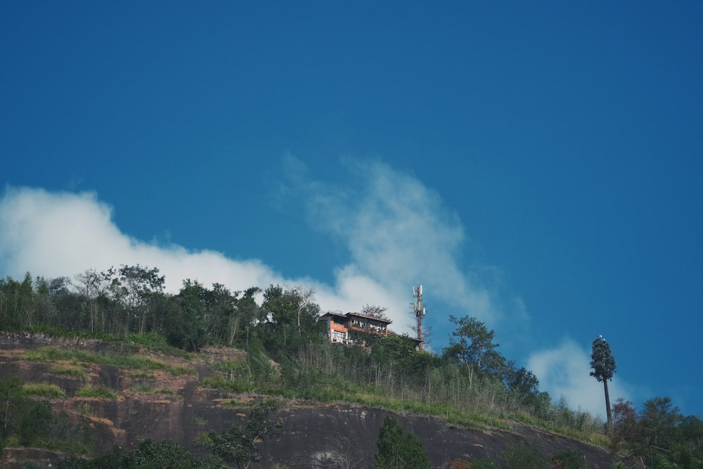 a hill with a house on top of it