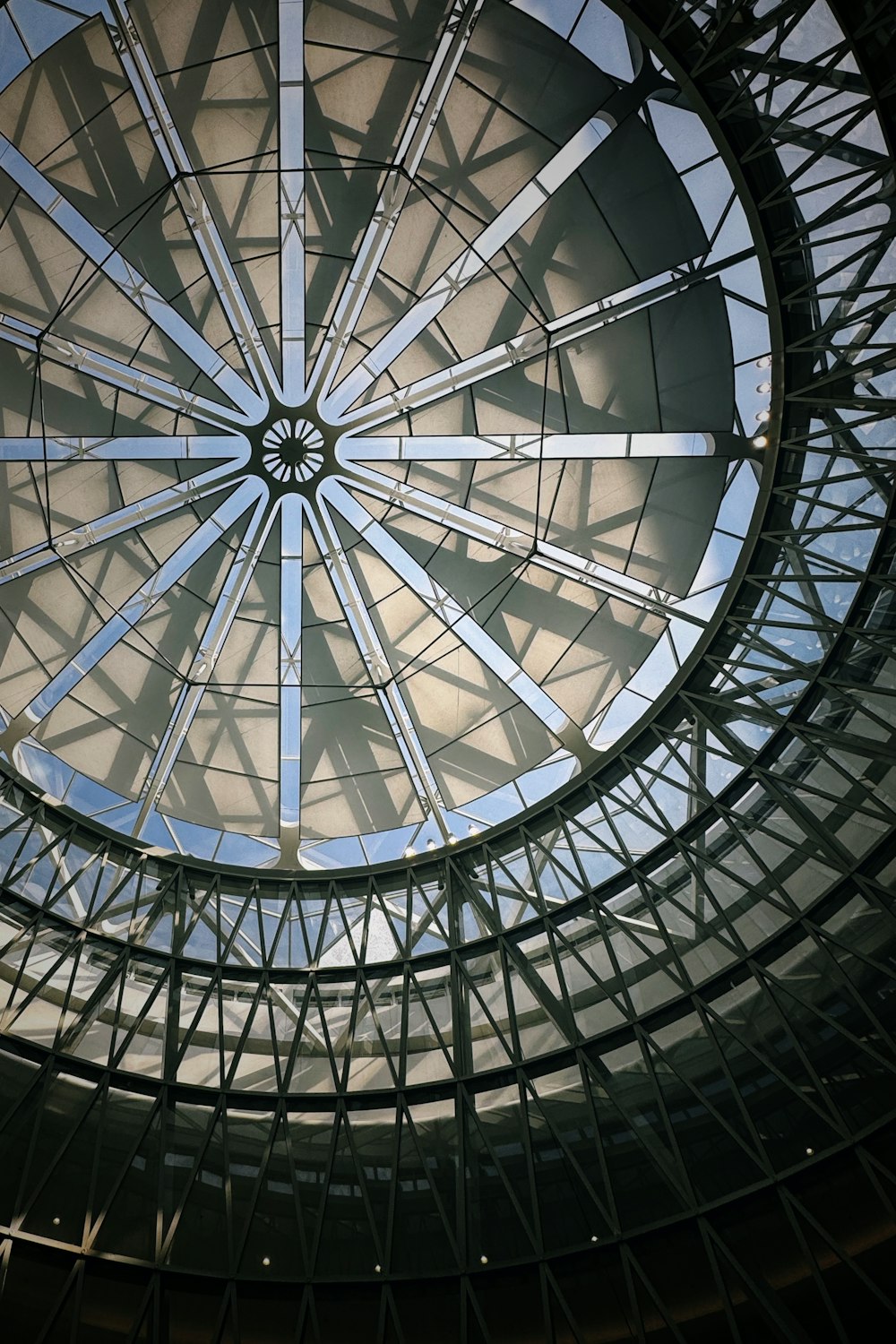 a circular glass ceiling in a building