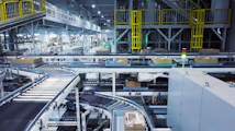 a factory filled with lots of machines and boxes
