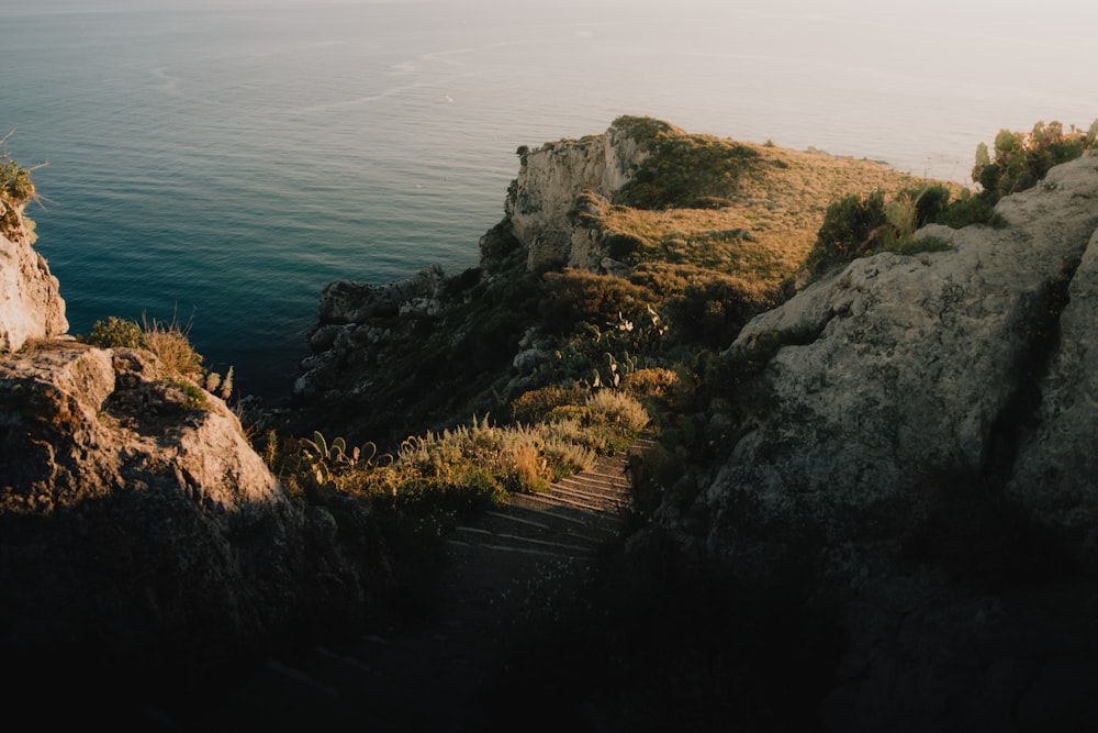 a view of the ocean from the top of a cliff